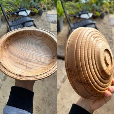 Handcrafted wooden bowl with natural grain patterns.
