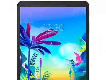 Tablet displaying a colorful tropical wallpaper with time 12:30.