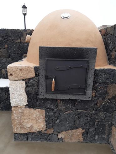 Puerta para horno de piedra.