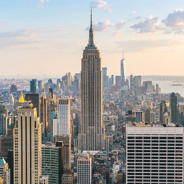 A beautiful cityscape featuring the Empire State Building at sunset.