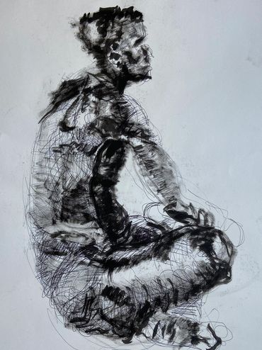 Figure drawing of a guy sitting.