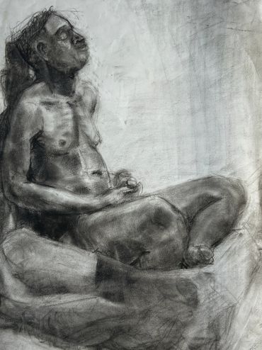 Figure drawing of a man sitting.