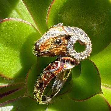 Vintage gold ring in the shape of a ram with diamond horns 