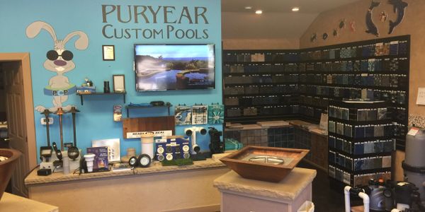 Puryear Custom Pools has an extensive selection of tile, coping stone, decking and out door living