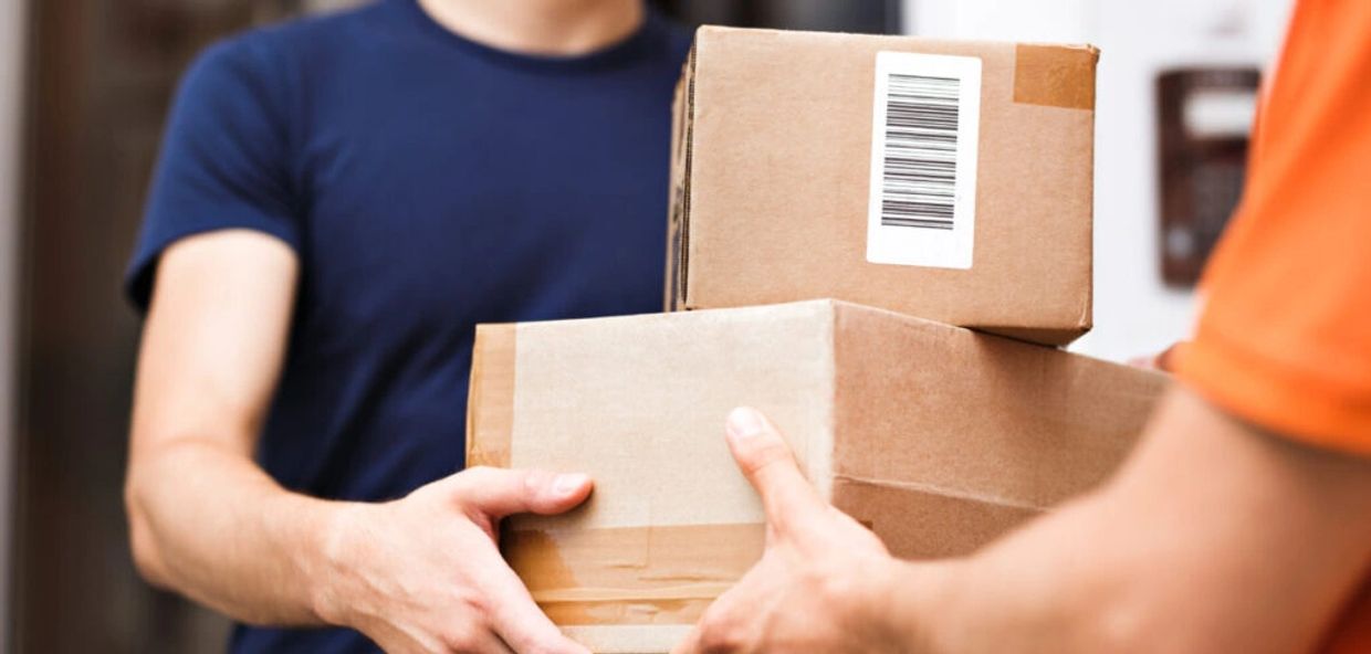 Two people exchanging packages.