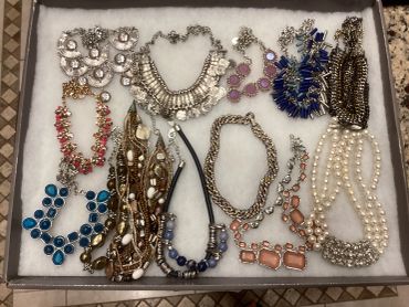 Various necklaces and jewelry pieces.