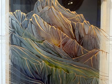 Artistic painting of rugged mountain peaks with detailed ridges and shadows.