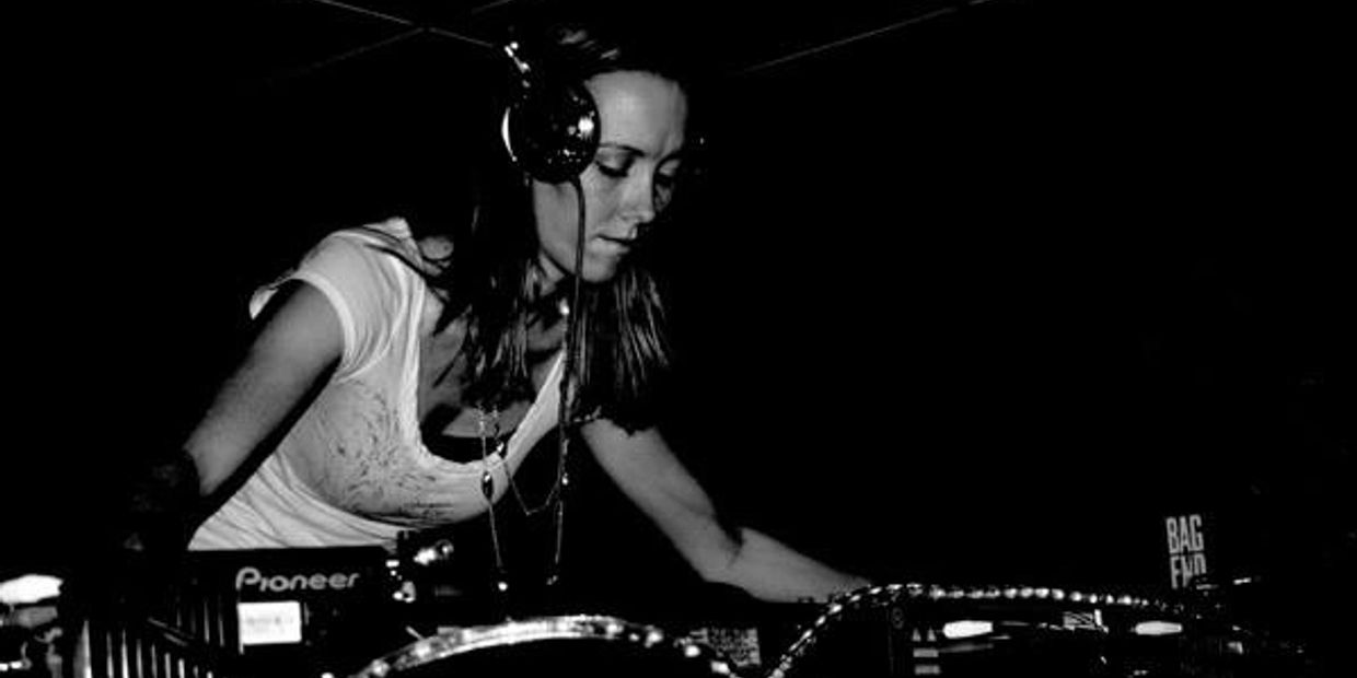 Megan Grassel D.J'ing at a club in 2006.