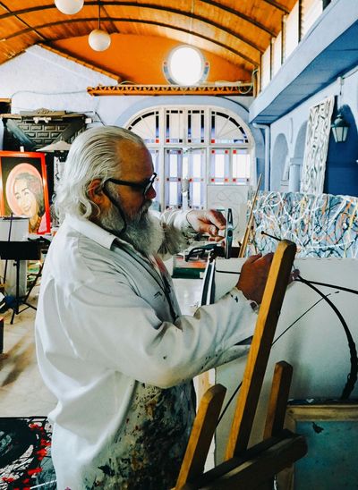 Julian Raven Artist in his studio in Puerto Banus, Marbella, Spain