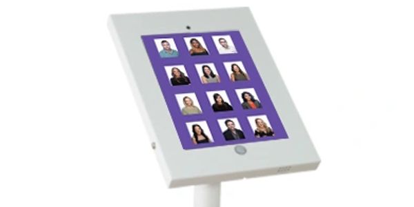 ipad on a stand showing a grid of professional headshot thumbnail photos