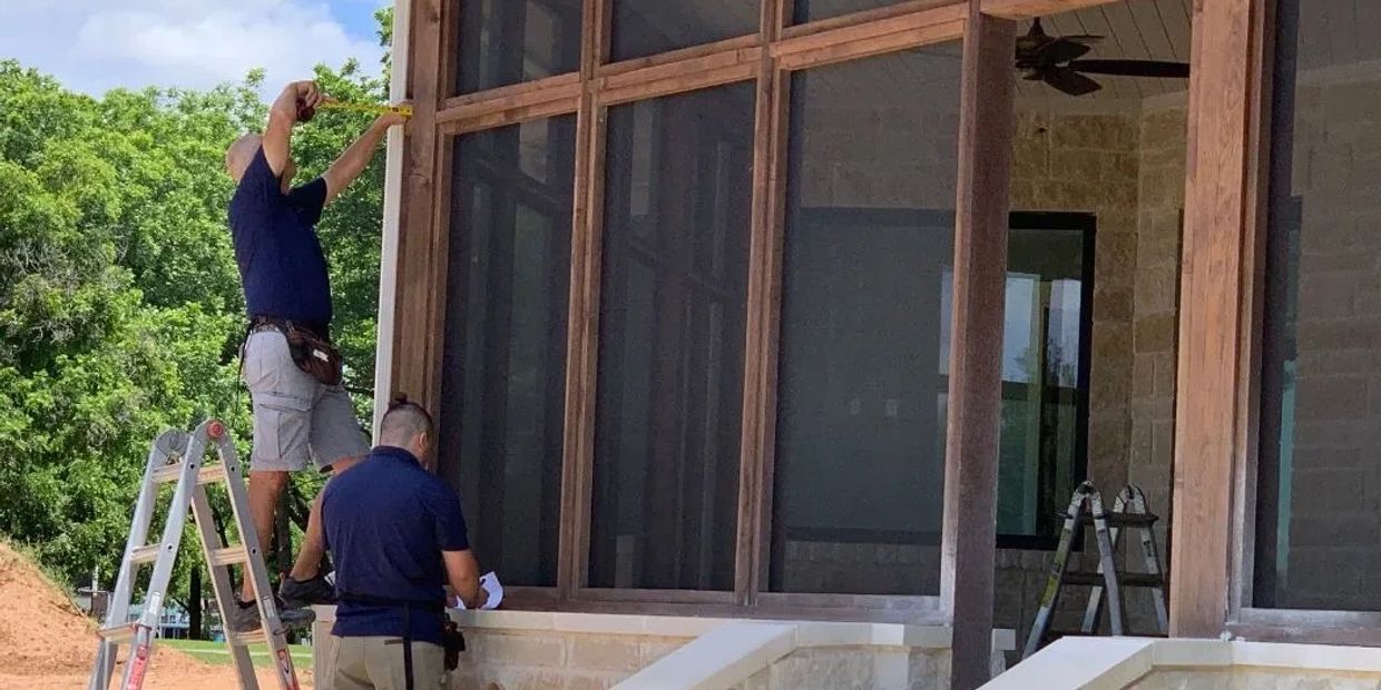 Wood framed Screened porch with custom made screen panels to fit.