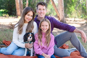 Family photo with Cavalier King Charles dog
