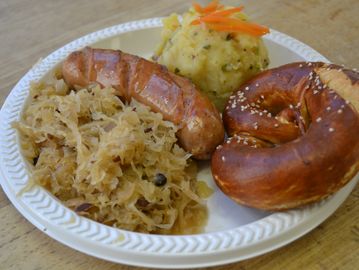 Bauernwurst with sauerkraut and potato salad 