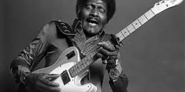 Albert Collins playing blues guitar.