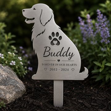 Metal garden memorial for a dog named Buddy with dates 2012-2024.