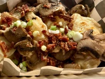 Delish Polish pierogi with mushrooms and bacon crumbles