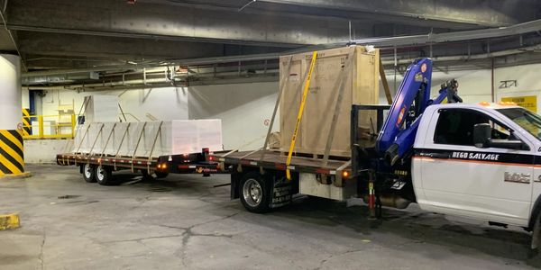 heavy equipment being transported on a trailer 