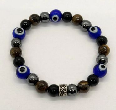 Beaded bracelet with blue evil eye beads and metallic gray accents.