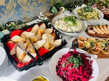 Variety of foods displayed on a catering table for an event in Liverpool.