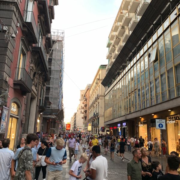 Busy street in Europe where tourist shop for goods and services. 