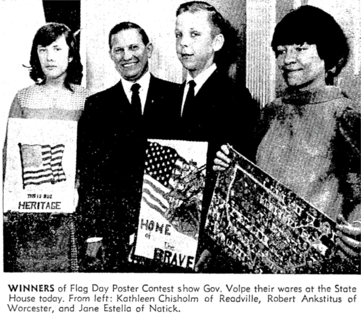 Winners of the Flag Day Poster Contest display their patriotic artworks.