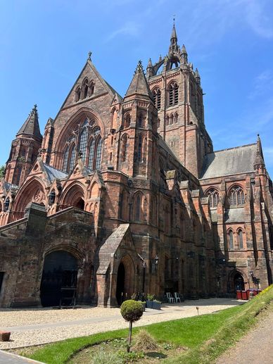 Historic Gothic cathedral under a clear blue sky.