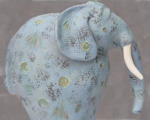 Esperanza is a dazzling pachyderm.  Highly textured, she is all decked out in shades of blues, green