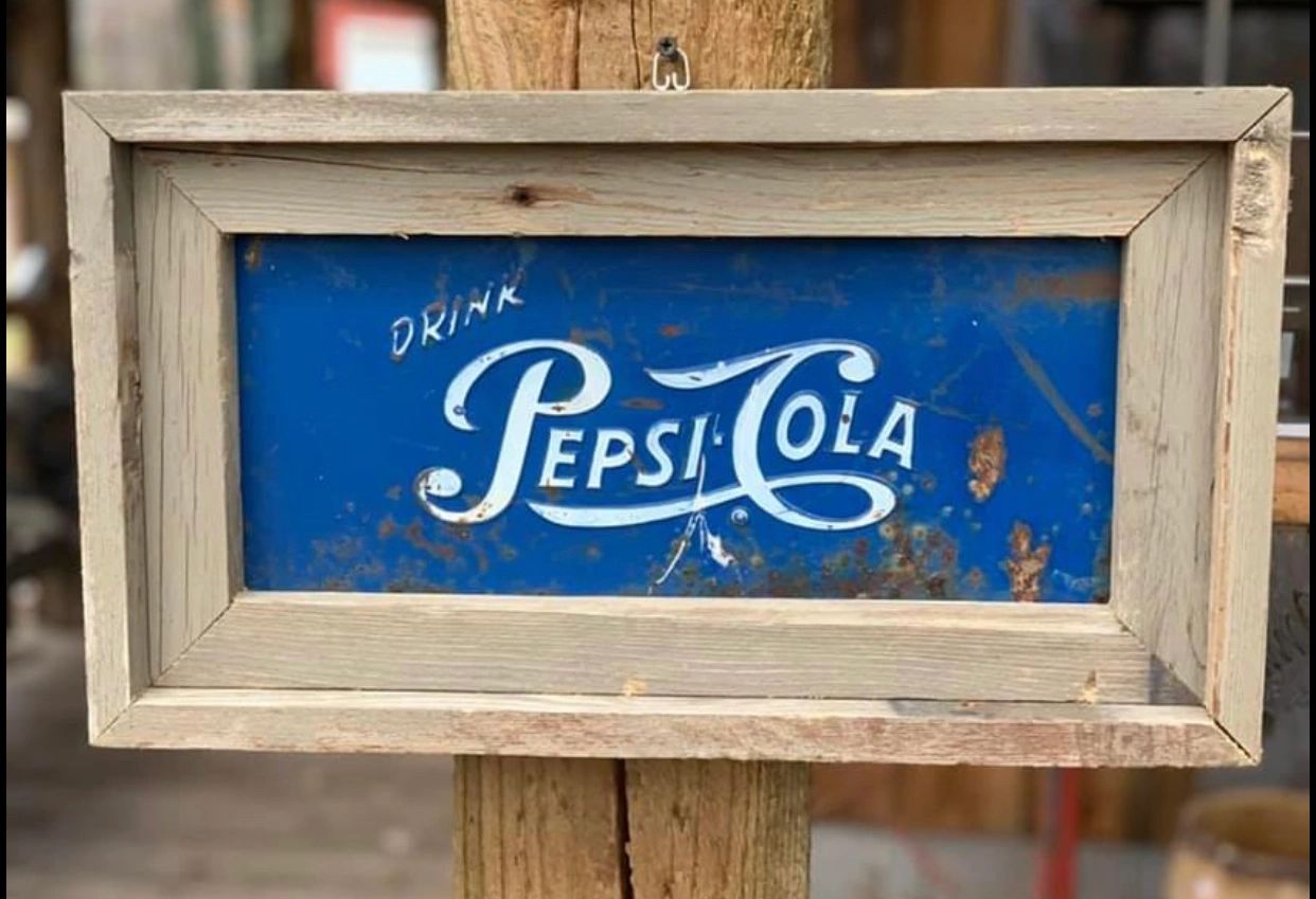 Vintage Pepsi cooler re-purposed into a sign