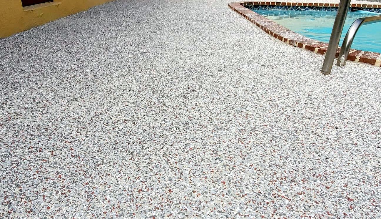 Backyard epoxy floor remodeling pool area