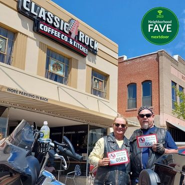 a couple out side the Classic Rock Coffee Co. & Kitchen