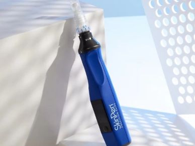 Blue SkinPen Precision device against a bright, shadowed background.