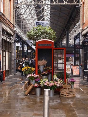 Johnny Flowers celebrates His Majesty King Charles III visit to Spitalfields Market.