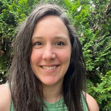 educator smiling at outdoor preschool near Kenmore, WA