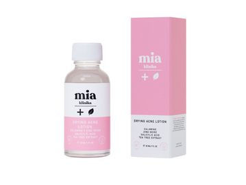 Bottle and box of Mia Klinika drying acne lotion.