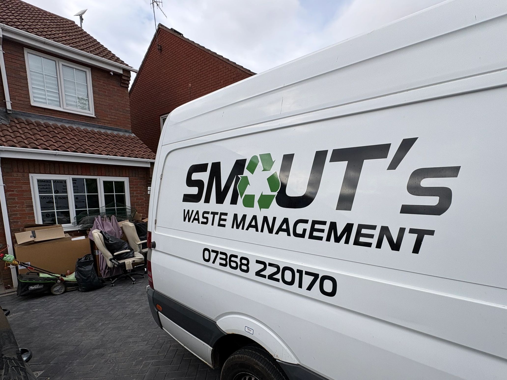 Smouts Waste Management Work Van At House Clearance