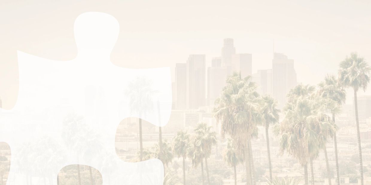 Skyline of a city with palm trees and a faded puzzle piece overlay.