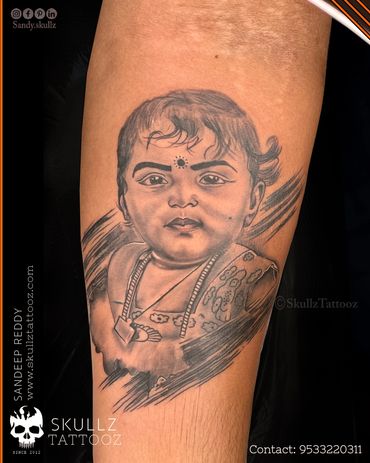 Portrait tattoo: A heartwarming tribute in ink, capturing her essence with exquisite artistry.