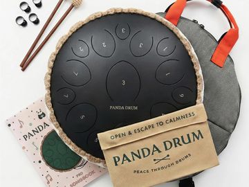 Panda Drum with accessories and carrying case.
