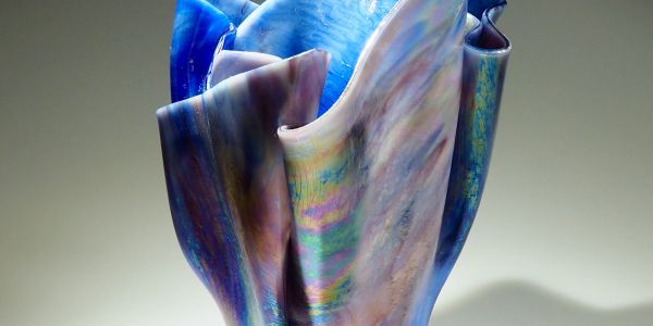 A colorful, wavy glass sculpture.