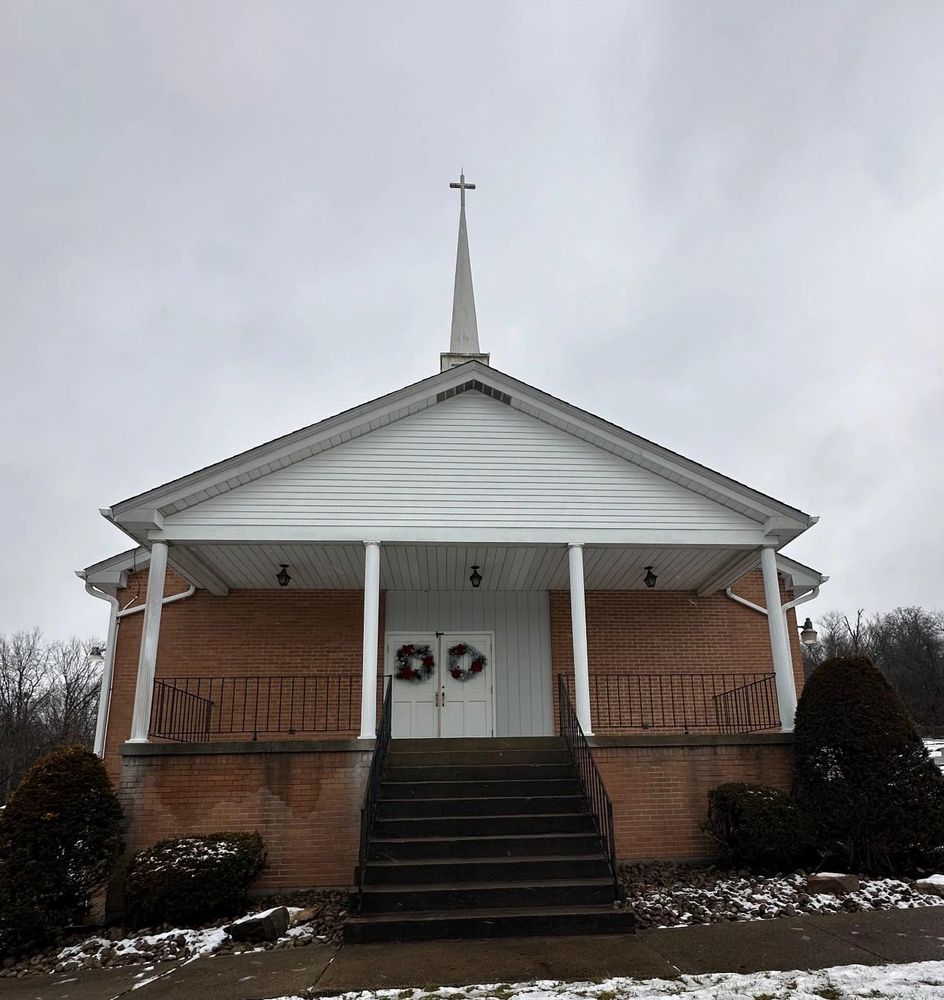 Front entrance exterior view of the Grace Fellowship Church building in McDonald, PA.