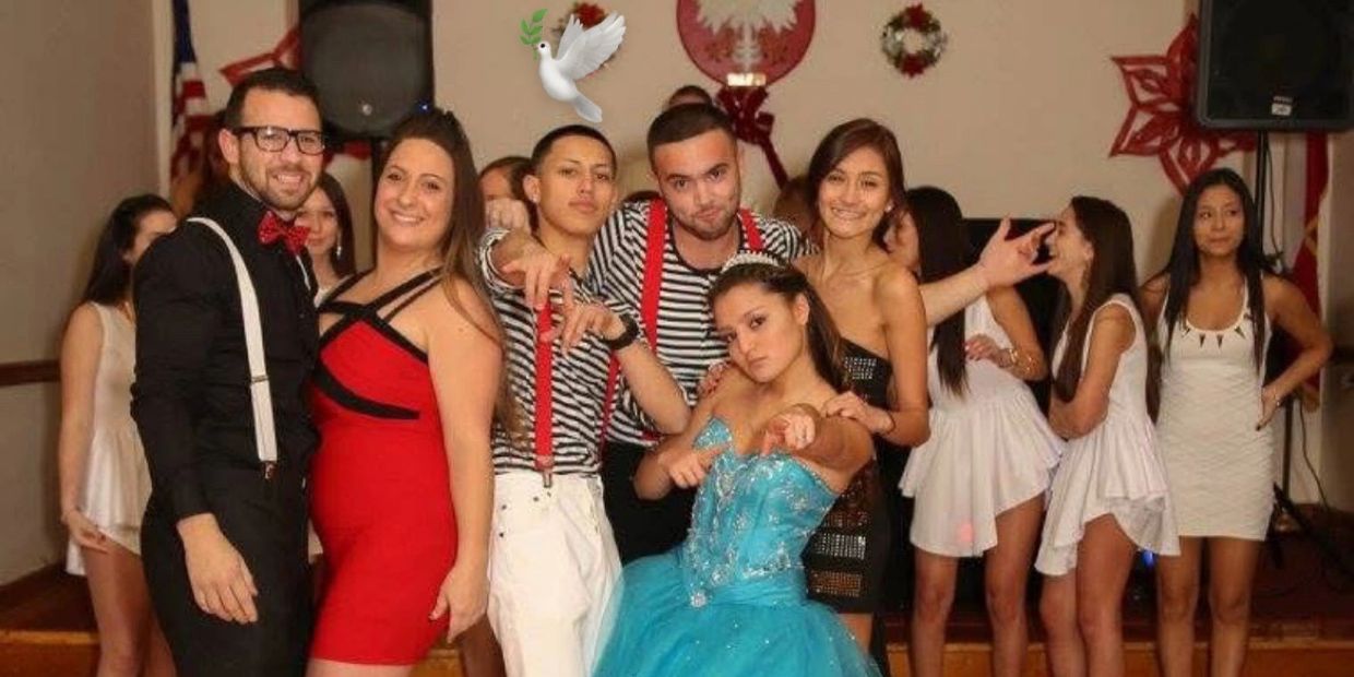 Group of young people posing at a party.