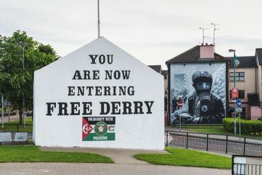 you are now entering free derry sign