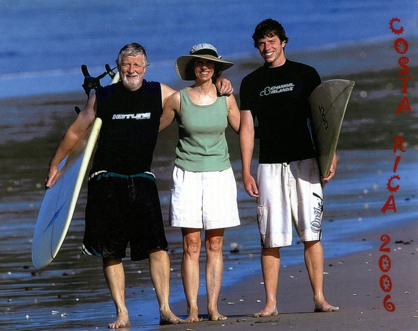 three people enjoying the beach