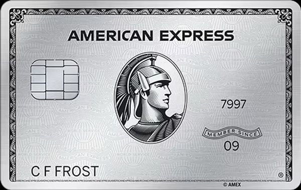 Silver American Express credit card with embossed name.