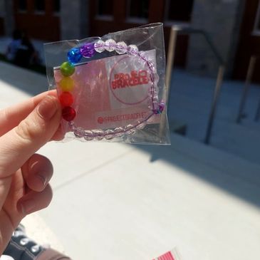 A pride bracelet being given out at West Bloomfield Middle School as support to LGBTQ+ people.