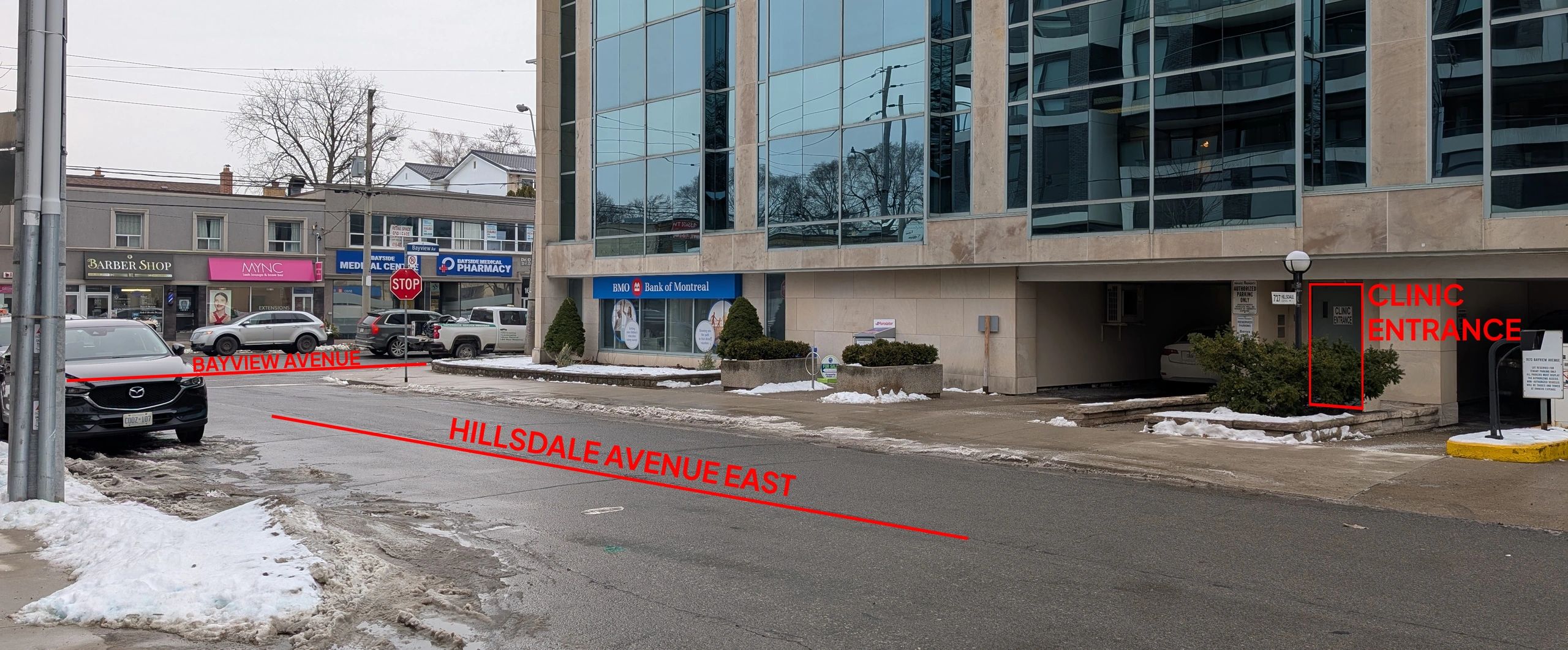 Street view showing clinic entrance and nearby businesses on Bayview Avenue and Hillsdale Avenue East.