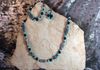 Blue and black acrylic beads with hematite spacers. Earring and bracelet included. Item # 18-10-14. Price $25.00