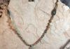 Green jasper stones and silver spacers and wire wrapped jasper stone hanger. Length 23.5 in. Item # 19-1-8. Price $20.00