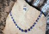 Blue glass beads with silver spacers. Simple elegance. Length 23.5 in. Item #19-1-23. price $15.00