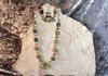 Green glass beads, agate round beads with crystal spacers. Green jasper stone hanger. Bracelet/earrings set. Length 22 in. Item #18-9-13. Price $25.00